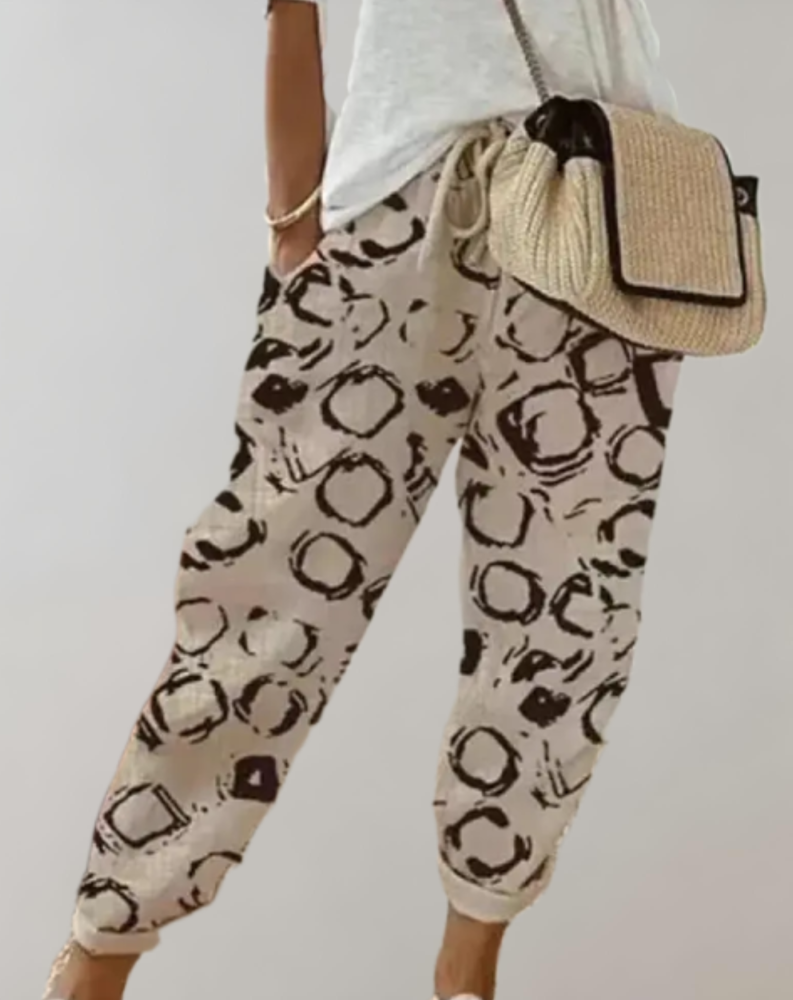 High-waisted broek met stropdas zijzakken en verschillende design prints