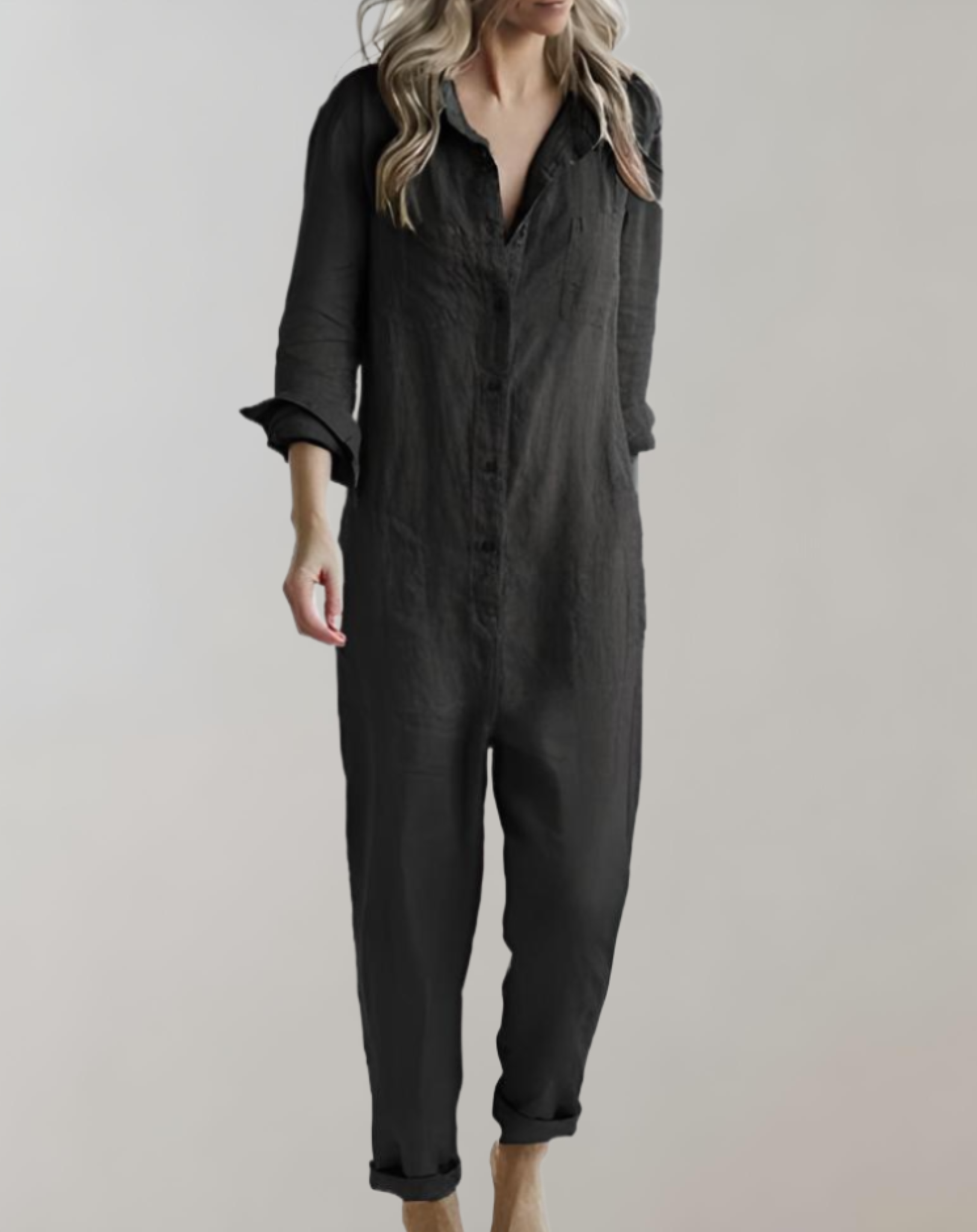 jumpsuit met losse polokraag, lange mouwen, knoopsluiting en meerdere zakken